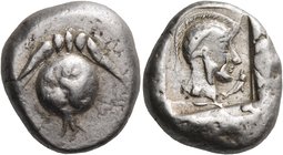 PAMPHYLIA. Side. Circa 460-430 BC. Stater (Silver, 21 mm, 10.77 g, 12 h), c. 460-450. Pomegranate on a stem with a leaf on each side. Rev. Helmeted he...