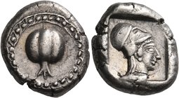 PAMPHYLIA. Side. Circa 450-430 BC. Stater (Silver, 18 mm, 10.87 g, 7 h), c. 440-430. Pomegranate surrounded by dotted guilloche border. Rev. Helmeted ...