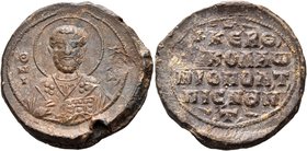 Nikolaos Metropolitan of Pessinus in Galatia, 11th century, c. 1054. Seal or Bulla (Lead, 29 mm, 19.45 g, 12 h). O/ N/I-K/OΛ/A' Nimbate facing bust of...