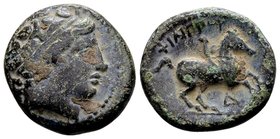 Kingdom of Macedon, Philip II. 
Uncertain mint in Macedon, 359-336 BC. Æ 17, 5.92 g. Head of Apollo right / ΦIΛIΠΠOY youth on horseback right; below:...