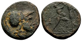Kingdom of Macedon, Antigonos II Gonatas. 
Pella or Amphipolis, 277-239 BC. Æ 17, 4.56 g. Head of Athena right wearing crested helmet / Pan erecting ...