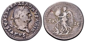 Divus Vespasian
Rome, 80-81 AD. AR denarius, 2.72 g. DIVVS AVGVSTVS VESPASIANVS• laureate head right / EX SC Victory standing left, placing shield on...