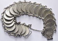 Coinjewelry
Bracelet with Neherlands, Wilhelmina 10 cent 1937-1941 (22x). 38.3 g. VF. SOLD AS IS. NO RETURN.