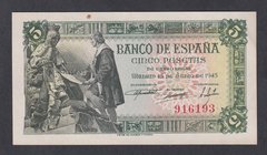 Estado Español, Banco de España
5 Pesetas. 15 junio 1945. Sin serie. ED.449. Punto de óxido en margen. EBC+.