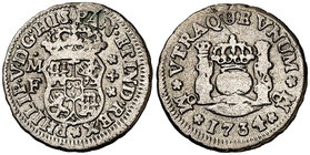 1734. Felipe V. México. MF. 1/2 real. (Cal. 1856). 1,33 g. Columnario. Resto de soldadura. (BC+/BC).