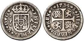 1734. Felipe V. Sevilla. PA. 1/2 real. (Cal. 1931). 1,41 g. MBC-.
