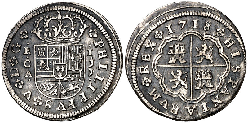 1718. Felipe V. Cuenca. JJ. 1 real. (Cal. 1451). 2,93 g. Pátina oscura. Buen eje...