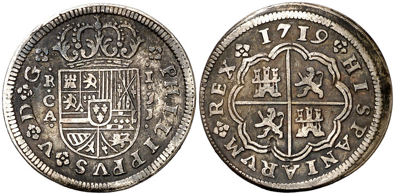 1719. Felipe V. Cuenca. JJ. 1 real. (Cal. 1452). 2,77 g. Pátina oscura. Hojita. ...