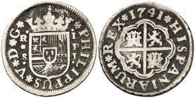 1741. Felipe V. Sevilla. PJ. 1 real. (Cal. 1727). 2,65 g. Pátina oscura. Ex Colección Vigo, Áureo 01/03/2000, nº 248. BC+.