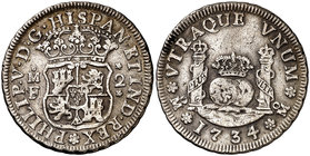 1734/3. Felipe V. México. 2 reales. (Cal. 1277). 6,53 g. Columnario. Rayitas. Ex Colección Vigo, Áureo 01/03/2000, nº 304. MBC.