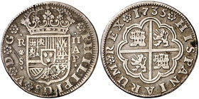 1735. Felipe V. Sevilla. AP. 2 reales. (Cal. 1436). 5,63 g. Rayitas y pequeña limadura. Ex Colección Vigo, Áureo 01/03/2000, nº 386. Escasa. MBC.