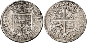1737. Felipe V. Sevilla. P. 2 reales. (Cal. 1439). 5,80 g. Único año de este ensayador. Rayitas de acuñación. Escasa. (MBC+).
