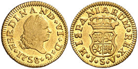1758. Fernando VI. Sevilla. JV. 1/2 escudo. (Cal. 275). 1,77 g. Estrellas en leyenda del anverso y florones en reverso. Parte de brillo original. Esca...