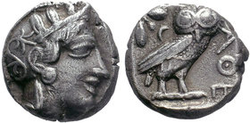 Attica, Athens AR Tetradrachm. Circa 454-404 BC. Head of Athena right, wearing crested Attic helmet ornamented with three olive leaves above visor and...