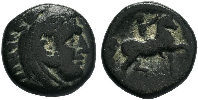 Macedonian Kingdom. Philip II. 359-336 B.C. AE unit . Head of young Herakles rig...