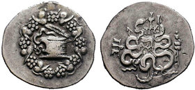 Mysia, Pergamon AR Cistophoric Tetradrachm. Circa 133-67 BC. Serpent emerging from cista mystica; the whole within wreath / Two serpents entwined arou...