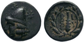 Troas, Birytis. civic issue. 4th-3rd centuries B.C. AE 20 Bronze. Beardless head of Kabeiros left, wearing pilos; stars flanking pilos / B - I / P - Y...