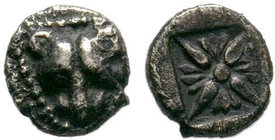Ionia, Miletos, late 6th-early 5th century BC. AR Obol. Panther or lion head facing. R/ Stellate floral pattern within incuse square. Klein 421-2; SNG...