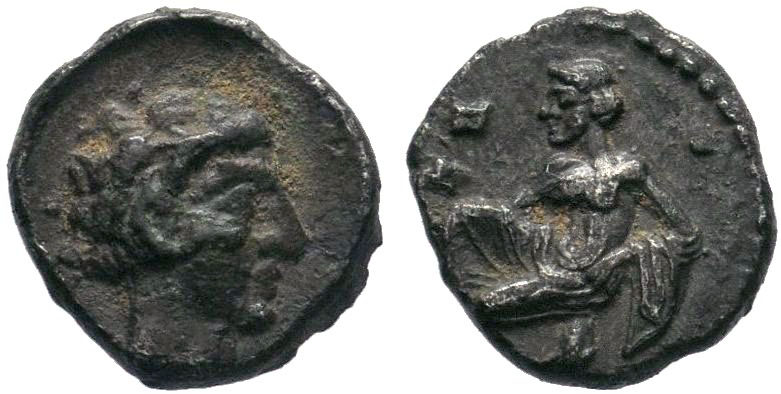 Cilicia, Tarsos AR Obol. Circa 389-375 BC. Female kneeling left, tossing astrala...