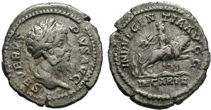 Septimius Severus. AD 193-211. AR Denarius . Rome mint. Struck late AD 203. Laur...