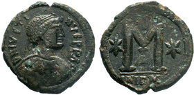 BYZANTINE.Justinian I. AE Follis, Nicomedia. DN IVSTINIANVS PP AVG, pearl diademed, draped, cuirassed bust right / Large M, star to left, cross above,...