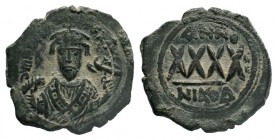 BYZANTINE.Phocas. 602-610 AD. AE Follis. Constantinople. DM FOCAE PP AVG, crowned, mantled bust facing, holding mappa and cross / Large XXXX, ANNO abo...