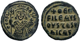 BYZANTINE.Theophilus AE Follis. 830-842 AD. Constantinople. ThEOFIL' bASIL' CL, crowned, three-quarter length figure of Theophilus facing, pellets on ...