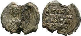 Lead seal of Timotheos protokouvoukleisios (11th cent.).
An interesting seal!
Condition: Slightly off-centered sealing, crack alongside the channel on...