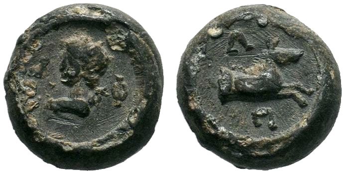 A Hellenistic or Roman lead seal or lead coin
Condition: About Very Fine, as in ...