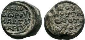 Byzantine lead seal of Theodoros chartoularios
 (7th cent.)
Condition: Slightly off-centered, otherwise VF/F. 

Obverse: Inscription in 4 lines, follo...