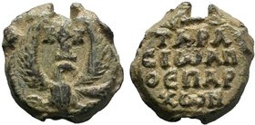 Byzantine lead seal of Tarasios honorary eparch. (8th cent.)

Obverse: Eagle with raised wings and head to right, invocative cruciform monogram above,...