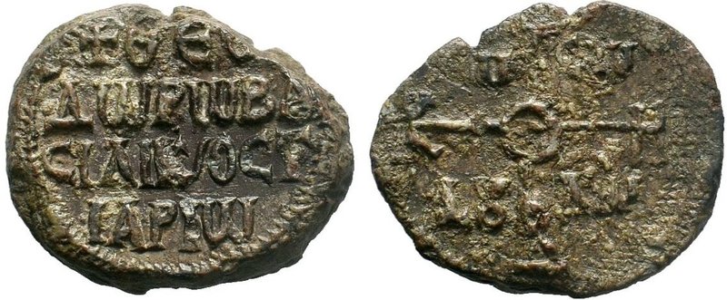 Byzantine lead seal of Theodoros imperial ostiarios (8th/9th cent.)
Obverse: Inv...
