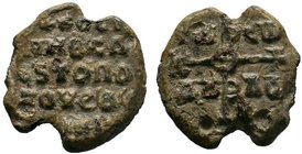 Byzantine lead seal of N. imperial silentarios (?) and topoteretes of...(8th/9th cent.)
Obverse: Invocative cruciform monogram, inscribed in four corn...