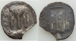 BRUTTIUM. Croton. Ca. 530-500 BC. AR stater or nomos (28mm, 6.64 gm, 12h). VF, chipped. ϘPO, ornamented tripod in relief / As obverse, incuse and reve...