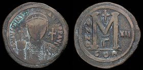 Justinian I (527-565) AE follis, issued 538/9 (year 12). Constantinople, 20.19g, 40mm. 
Obv: D N IVSTINIANVS P P AVI; Diademed, helmeted and cuirasse...