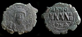 Phocas (602-610), AE follis, issued 605 - 606. Constantinople, 1st Officina, 11.53g, 35mm.
Obv: DN FOCAS PЄRP AUC, Crowned bust facing, wearing consu...