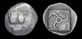 DYNASTS of LYCIA: Mithrapata (c. 390-370), AR Sixth Stater (Diobol). 1.5g, 13.8mm. 
Obv: Lion scalp facing. 
Rev: Triskeles; arrow in one section, l...