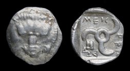 DYNASTS of LYCIA: Mithrapata (c. 390-370), AR Sixth Stater (Diobol). 1.09g, 12.6mm. 
Obv: Lion scalp facing. 
Rev: Triskeles; astragalos in one sect...