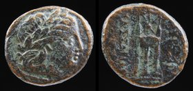 KINGS OF MACEDON: Kassander (305-298 BCE), AE unit. 
Obv: Laureate head of Apollo right.
Rev: ΒΑΣΙΛΕΩΣ KAΣΣANΔPOY, tripod. 
SNG Alpha Bank 895-6....
