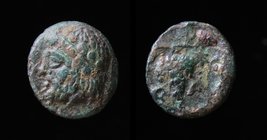 AEOLIS, Temnos, 4th-3rd c. BCE, AE10. 10mm. 
Obv: Bearded, laureate head of Dionysos left. 
Rev: T-A T-A to left and right of bunch of grapes on vin...