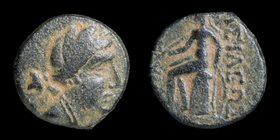SELEUKID KINGDOM: Seleukos III (225/4-222 BCE), AE 13. Antioch, 3.34g, 13mm.
Obv: Head of Artemis r. 
Rev: Apollo seated l. on omphalos, holding bow...