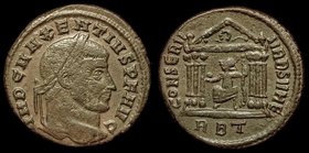 Maxentius (306-312) AE follis, issued 310-11. Rome, 6.4g. 
Obv: Laureate head r. 
Rev: Roma seated facing, head l., within hexastyle temple, holding...