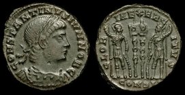 Constantine II as Caesar (317-337) AE3, issued 330-3. Constantinople, 2.6g.
Obv: Laureate and cuirassed bust r. 
Rev: Two soldiers flanking two stan...