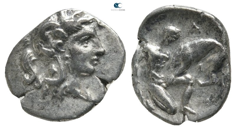 Calabria. Tarentum 380-325 BC. 
Diobol AR

14 mm., 1,01 g.

Helmeted head o...
