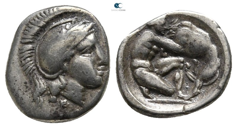 Calabria. Tarentum 380-325 BC. 
Diobol AR

12 mm., 1,19 g.

Helmeted head o...