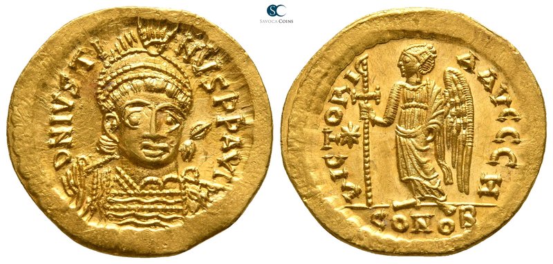 Justin I AD 518-527. Struck AD 518-519. Constantinople. 8th officina
Solidus AV...