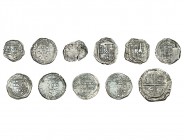 11 monedas: real (2), 2 reales, 4 reales (2), 8 reales. Portugal, tostao, Felipe I (2) y Sebastián (3). Leves oxidaciones marinas. MBC/MBC+.