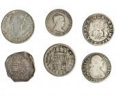 6 monedas: 2 reales (5), Felipe II, Sevilla; 1719, Madrid; 1767, Potosí; 1783, México; 1798, Sevilla y 4 reales, 1849, Madrid. bc/bc+.