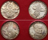 Vatican / Papal States Lot of 2 Medals 1975 "Anno Santo"
Each Medal is Silver 12.5g 30mm; Proof; Different Motives; Comes with Original Package