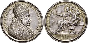 Roma. Clemente XI (Giovanni Francesco Albani), 1700-1721. Medaglia anno XVIII (1718). AR 28,60 g. Ø 39,30 mm. Per ricordare le opere eseguite nella ba...